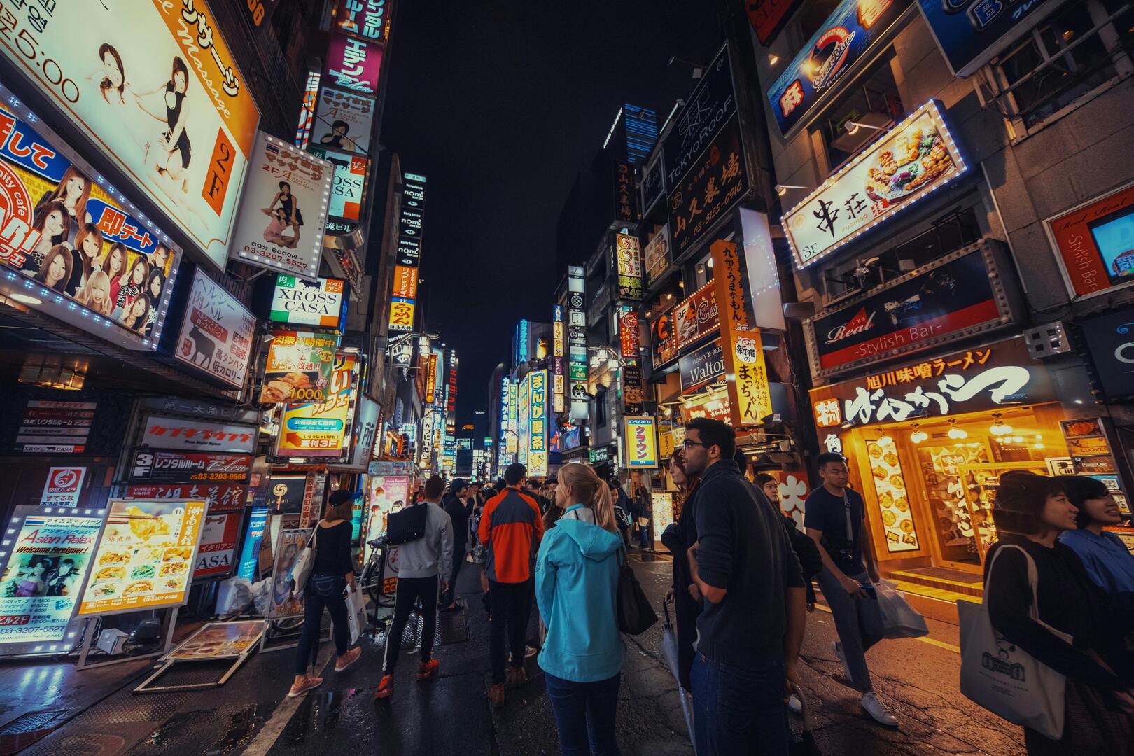 Shibuya nightlife with neon lights and bars